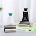 XYKEEY Toothpaste Tube Squeezer - Set of 2 Toothpaste Squeezer Rollers, Metal Toothpaste Tube Wringer Seat Holder Stand (Matt Black) Matt Black