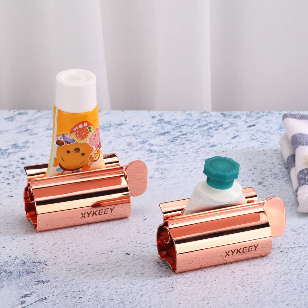 XYKEEY Toothpaste Tube Squeezer - Set of 2 Toothpaste Squeezer Rollers, Metal Toothpaste Tube Wringer Seat Holder Stand (Matt Black) Matt Black